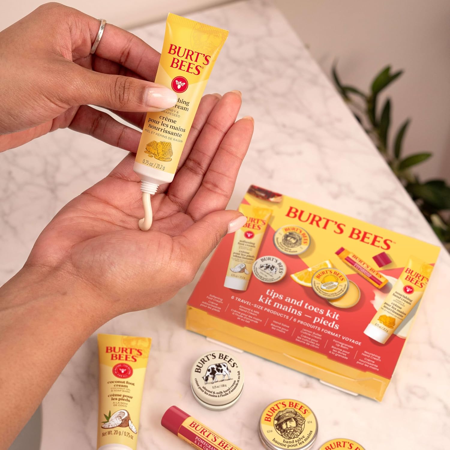 Burt's Bees Christmas Gifts - Tips and Toes Kit, 6 Travel Size Products for Stocking Stuffers - Pomegranate Moisturizing Lip Balm, 2 Hand Creams, Foot Cream, Cuticle Cream, and Hand Salve - Image 9
